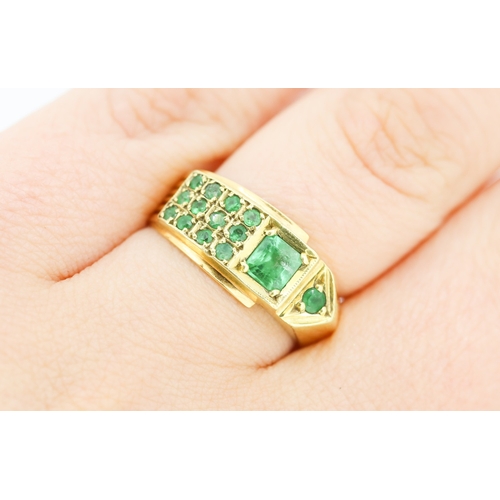 210 - Emerald Set Buckle Motif Cluster Ring Mounted in 18 Carat Yellow Gold Ring Size P