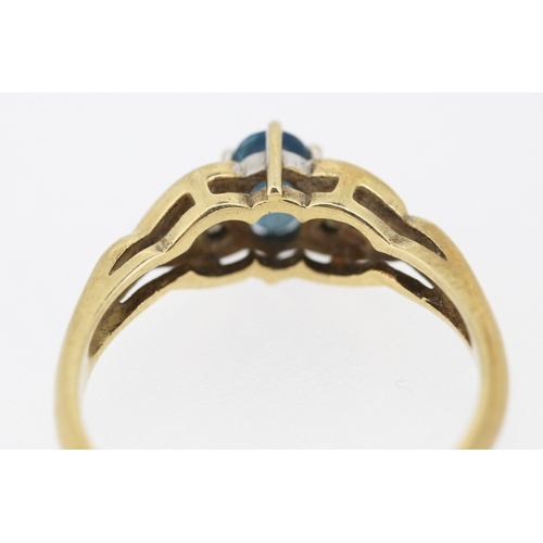 216 - Blue Topaz and Diamond Set Ring Mounted in 9 Carat Yellow Gold Ring Size O