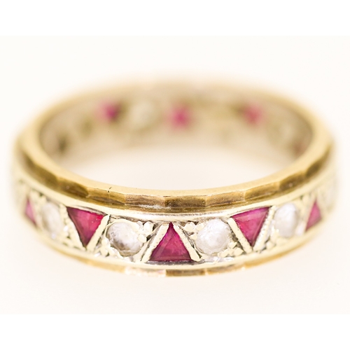 22 - Triangle Cut Ruby Set Eternity Ring Mounted in 9 Carat Yellow Gold Ring Size R