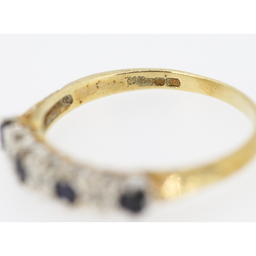 220 - Sapphire Four Stone Ring with Diamond Insets Mounted in 9 Carat Yellow Gold Ring Size O and a Half