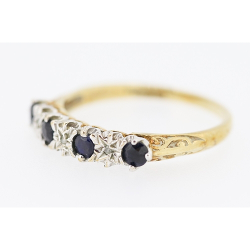 220 - Sapphire Four Stone Ring with Diamond Insets Mounted in 9 Carat Yellow Gold Ring Size O and a Half