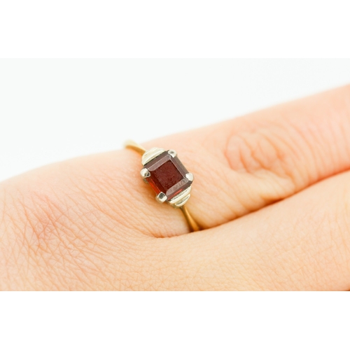 225 - Red Garnet Set Single Stone Ring Mounted in 9 Carat Yellow Gold Ring Size L and a Half