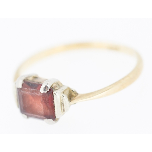 225 - Red Garnet Set Single Stone Ring Mounted in 9 Carat Yellow Gold Ring Size L and a Half