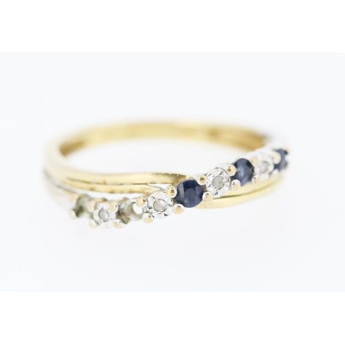 226 - Sapphire and Diamond Set Crossover Form Ring Mounted in 9 Carat Yellow Gold Ring Size K and a Half N... 