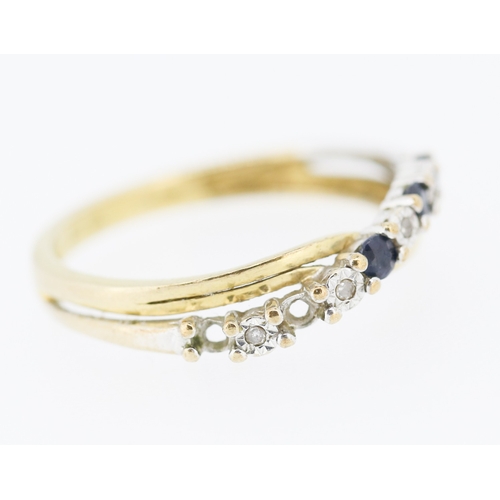 226 - Sapphire and Diamond Set Crossover Form Ring Mounted in 9 Carat Yellow Gold Ring Size K and a Half N... 