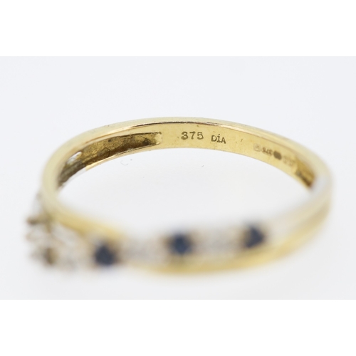 226 - Sapphire and Diamond Set Crossover Form Ring Mounted in 9 Carat Yellow Gold Ring Size K and a Half N... 