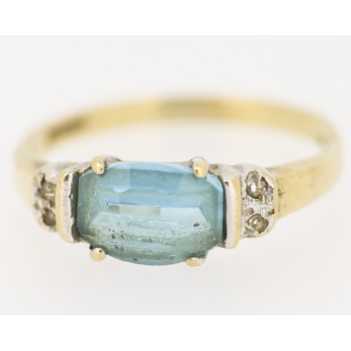 231 - Aquamarine Set Ring with Diamond Insets to Shoulders Mounted in 9 Carat Yellow Gold Ring Size M