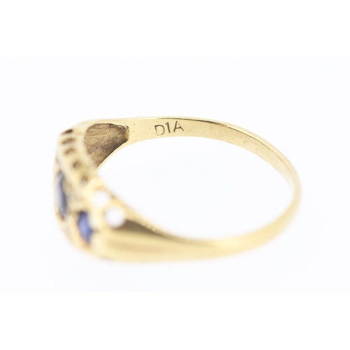 235 - Sapphire Three Stone Ring with Diamond Insets Mounted in 9 Carat Yellow Gold Ring Size N