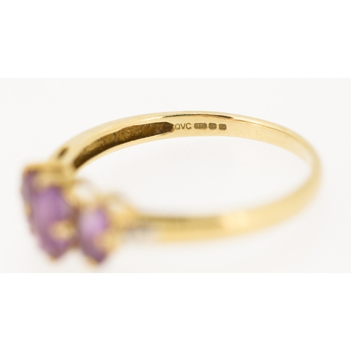 238 - Amethyst Three Stone Set Ring with Diamond Insets to Shoulders Mounted in 9 Carat Yellow Gold Ring S... 