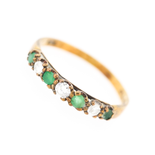 251 - Emerald and Diamond Set Seven Stone Ring Mounted in 9 Carat Yellow Gold Ring Size O and a Half