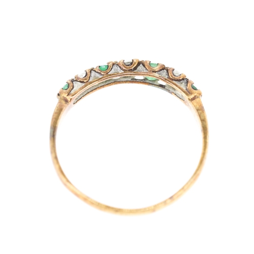 251 - Emerald and Diamond Set Seven Stone Ring Mounted in 9 Carat Rose Gold Ring Size O and a Half