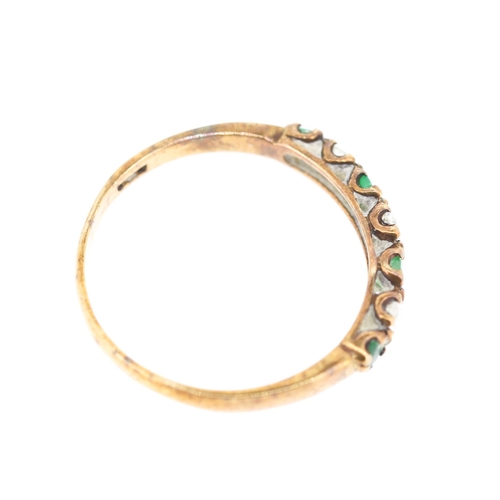 251 - Emerald and Diamond Set Seven Stone Ring Mounted in 9 Carat Yellow Gold Ring Size O and a Half