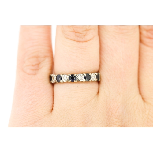 252 - Sapphire Five Stone Ring with Diamond Insets Mounted in 9 Carat White Gold Ring Size N