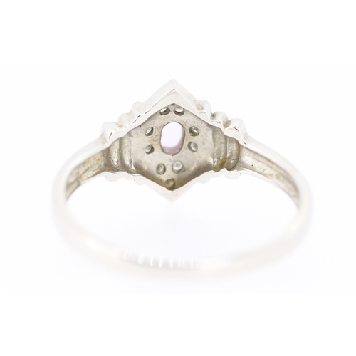 253 - Attractively Detailed Morganite and Diamond Set Ring Mounted in 9 Carat White Gold Ring Size N and a... 