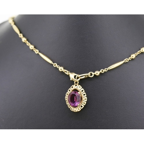 263 - Amethyst Set Pendant Mounted in 9 Carat Yellow Gold 2cm High Set on a Gilded Chain 75cm Long