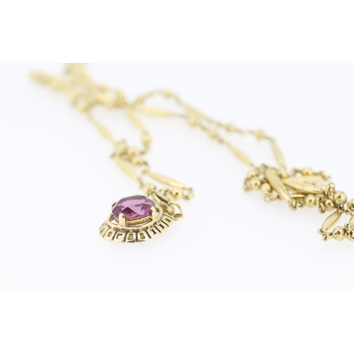 263 - Amethyst Set Pendant Mounted in 9 Carat Yellow Gold 2cm High Set on a Gilded Chain 75cm Long