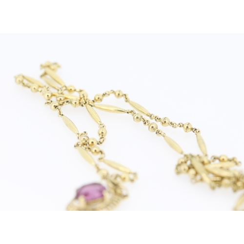 263 - Amethyst Set Pendant Mounted in 9 Carat Yellow Gold 2cm High Set on a Gilded Chain 75cm Long