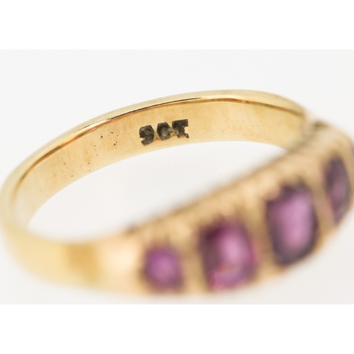 276 - Pink Garnet Five Stone Graduated Form Ring Mounted in 9 Carat Yellow Gold Ring Size M and a Half