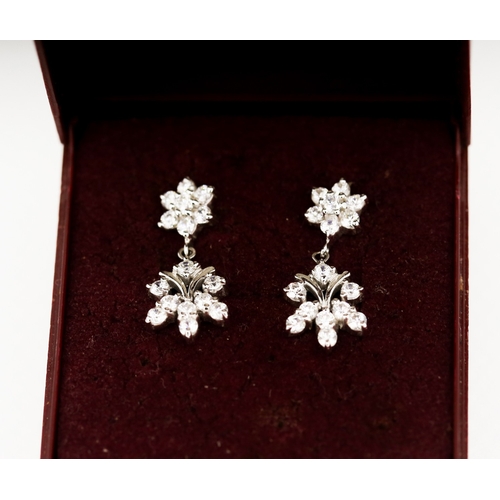 277 - Pair of White Sapphire Set Ladies Cluster Earrings Mounted in 18 Carat White Gold 2cm High