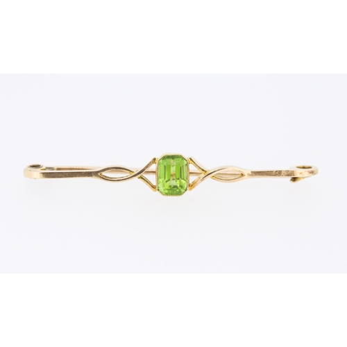 279 - Bezel Set Peridot Brooch Mounted in 15 Carat Yellow Gold 5cm Wide