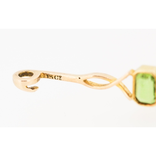 279 - Bezel Set Peridot Brooch Mounted in 15 Carat Yellow Gold 5cm Wide