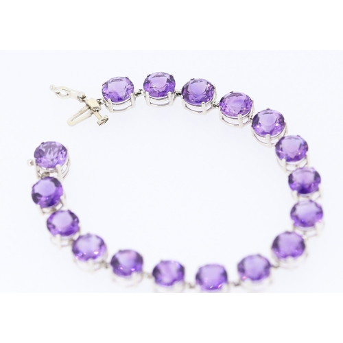 281 - Amethyst Seventeen Stone Set Bracelet Mounted in 14 Carat White Gold 17.5cm Long