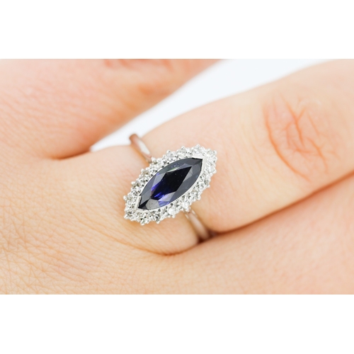 283 - Marquise Cut Sapphire Centre Stone Ring with Diamond Set Surround Set in Platinum Mounted on 18 Cara... 