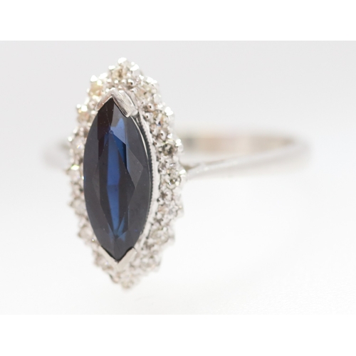 283 - Marquise Cut Sapphire Centre Stone Ring with Diamond Set Surround Set in Platinum Mounted on 18 Cara... 