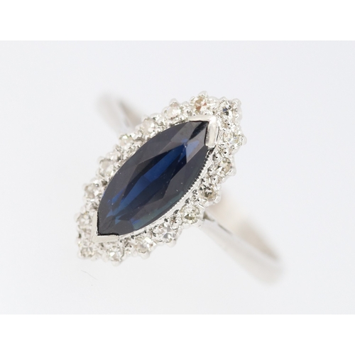 283 - Marquise Cut Sapphire Centre Stone Ring with Diamond Set Surround Set in Platinum Mounted on 18 Cara... 