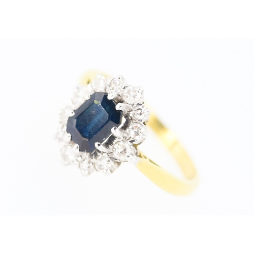 285 - Sapphire Centre Stone Ring with Diamond Set Halo Surround Set in Platinum Mounted on 18 Carat Yellow... 