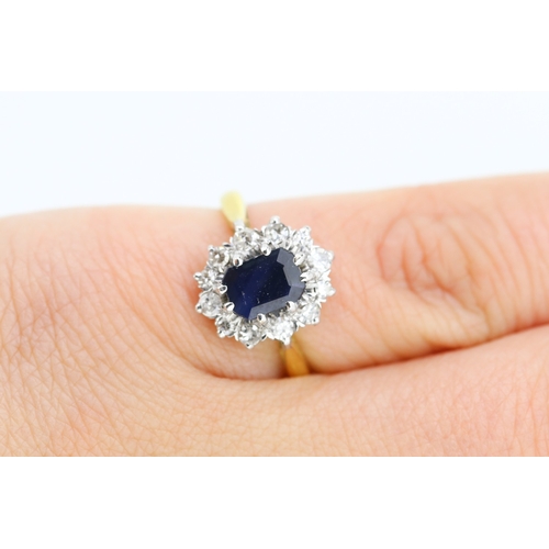 285 - Sapphire Centre Stone Ring with Diamond Set Halo Surround Set in Platinum Mounted on 18 Carat Yellow... 