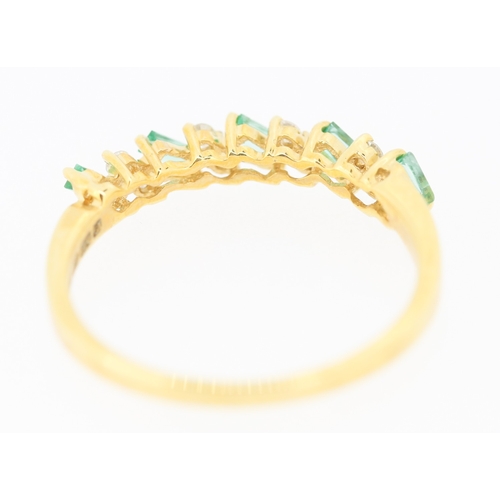 286 - Attractively Detailed Baguette Cut Emerald and Diamond Set Ring Mounted in 18 Carat Yellow Gold Ring... 