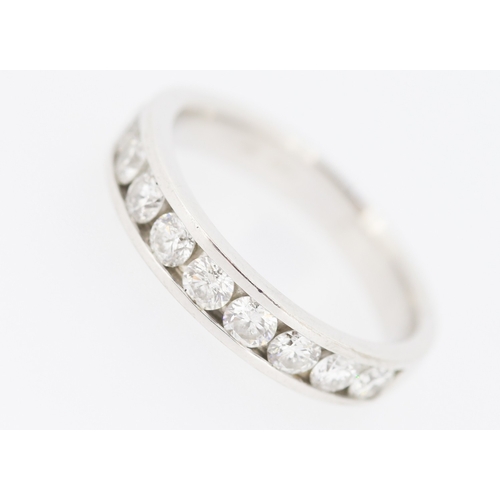 289 - Ten Stone Diamond Channel Set Ring Mounted in 18 Carat White Gold Ring Size M and a Half Total Diamo... 