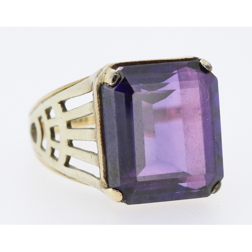 29 - Single Stone Violet Amethyst Set Statement Ring Mounted in 9 Carat Yellow Gold Ring Size S