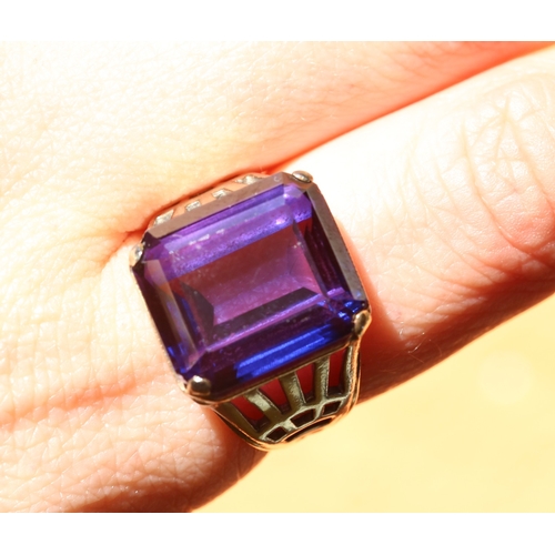 29 - Single Stone Violet Amethyst Set Statement Ring Mounted in 9 Carat Yellow Gold Ring Size S