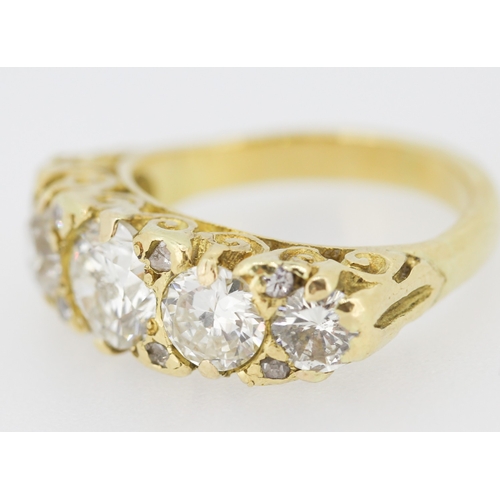 30 - Diamond Five Stone Graduated Form Ring with Further Diamond Insets Mounted in 18 Carat Yellow Gold R... 