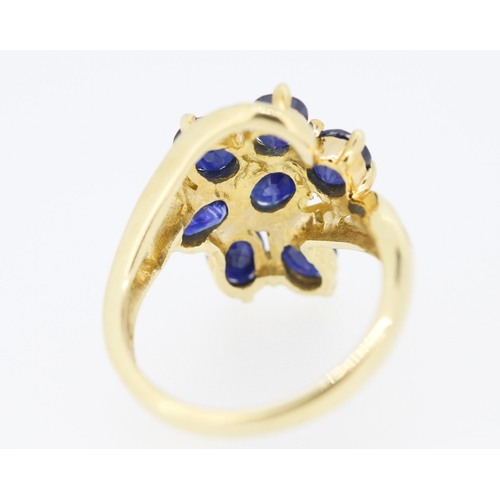 306 - Sapphire Set Seven Stone Floral Form Ring Set in 9 Carat Yellow Gold with Further Diamonds to Settin... 