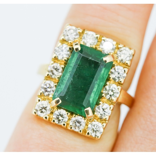 308 - Emerald and Fourteen Diamond Set Ladies Ring Mounted in 18 Carat Yellow Gold Total Emerald Carat Wei... 