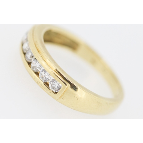 317 - Cubic Zirconia Set Half Eternity Ring Mounted in 9 Carat Yellow Gold Ring Size M