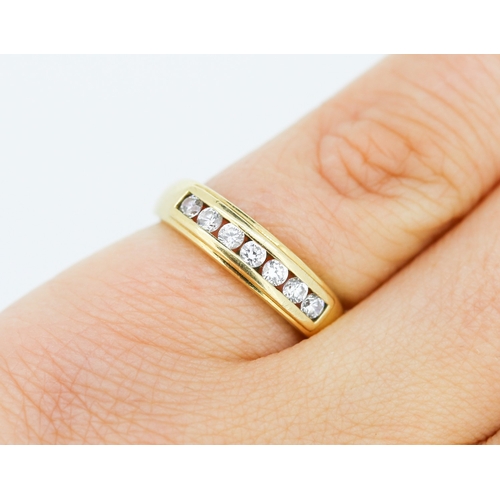 317 - Cubic Zirconia Set Half Eternity Ring Mounted in 9 Carat Yellow Gold Ring Size M