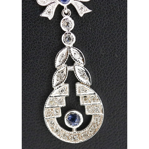 321 - Finely Detailed Diamond and Tanzanite Set Bow Motif Necklace Set in 9 Carat White Gold Pendant Drop ... 