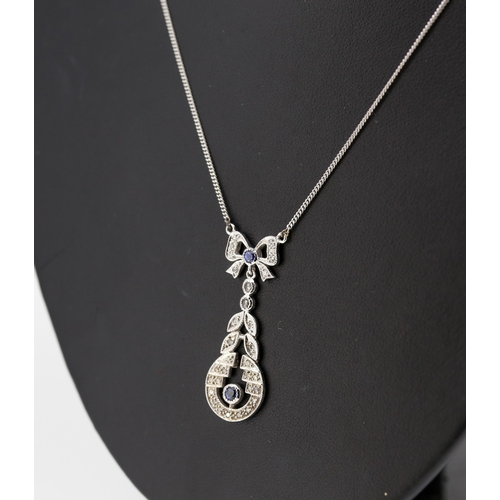 321 - Finely Detailed Diamond and Tanzanite Set Bow Motif Necklace Set in 9 Carat White Gold Pendant Drop ... 