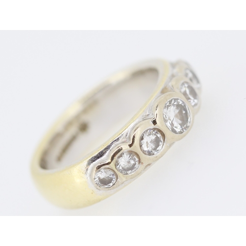 334 - Diamond Seven Stone Bezel Set Ring Mounted on 18 Carat Yellow Gold Ring Size M