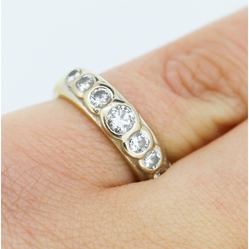 334 - Diamond Seven Stone Bezel Set Ring Mounted on 18 Carat Yellow Gold Ring Size M