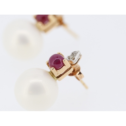 337 - Pair of Ruby and Diamond Set Pearl Earrings Mounted in 14 Carat Rose Gold Each 2cm High