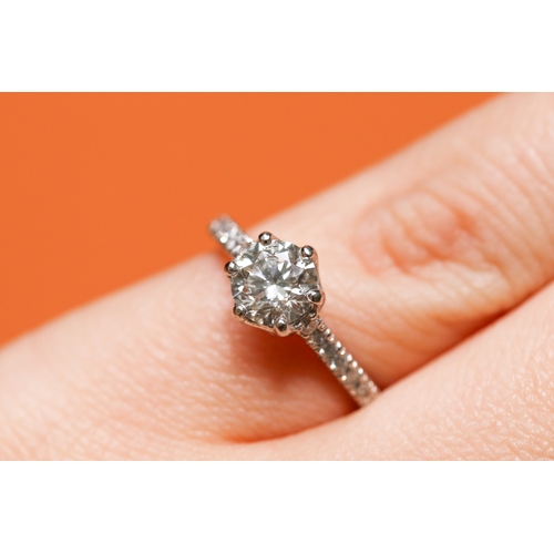 34 - Diamond Solitaire Six Claw Set with Further Diamonds Set to Shoulders Mounted in 18 Carat White Gold... 