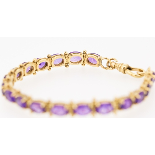 35 - Amethyst Nineteen Stone Set Bracelet Mounted in 9 Carat Yellow Gold 18.5cm Long