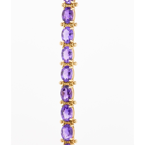 35 - Amethyst Nineteen Stone Set Bracelet Mounted in 9 Carat Yellow Gold 18.5cm Long