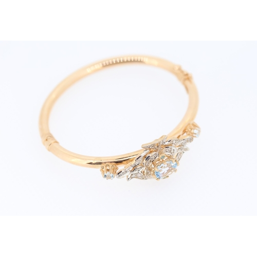 352 - 9 Carat Rose Gold Aquamarine Set Ladies Bangle Further Decorated with Diamonds Inner Width 6.5cm