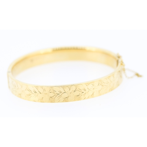 361 - 9 Carat Yellow Gold Bangle Bracelet Incised Floral Detailing Inner Width 6.5cm